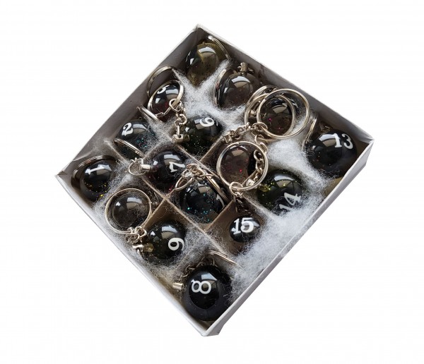 Box of transparent billiard key chains